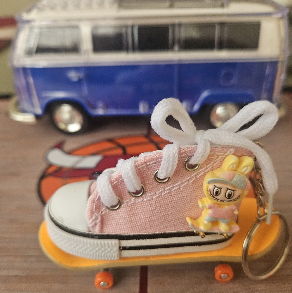 Kids Pink High-Top Sneaker Keychain.